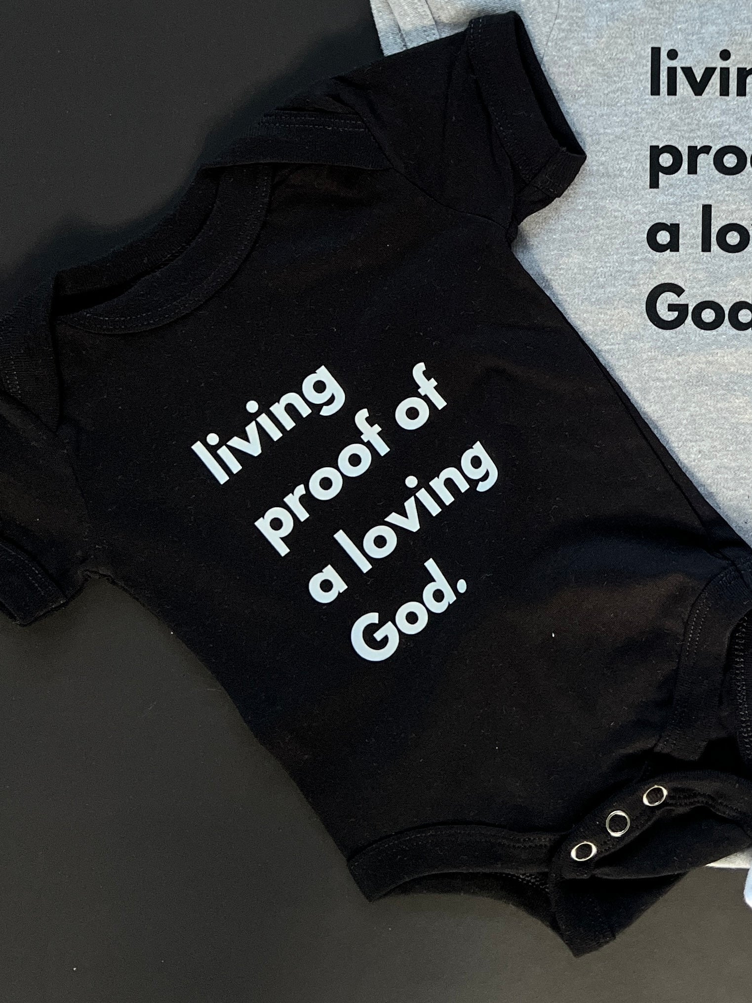 Lil Free Living Proof of a Loving God Onesie